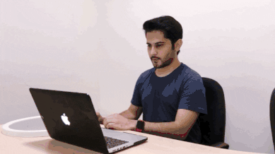 Animation showing a test-taker scanning their desk and room using a mirror